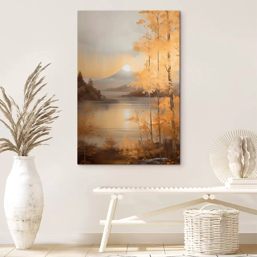 Obraz Podzimní stromy s oranžovými listy rámují klidné jezero s vzdálenými horami pod zamračenou oblohou. Č. s47440